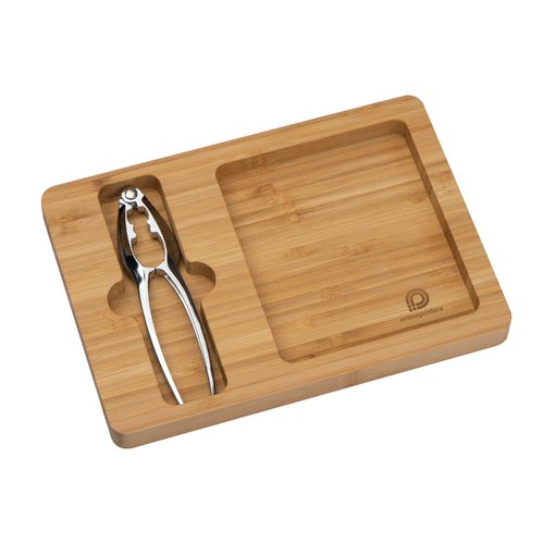 Holzfarbene Bambus-Schale mit Nussknacker aus Metall.