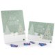 Gr�ner Papier Adventskalender mit nummerierten T�rchen.