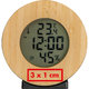 Holz-Wetterstation mit digitaler Anzeige und Sensoren.